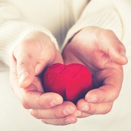 heart,gift in the hands of men. offer love to a woman.holiday valentine's day.wedding.toned image..selective focus.