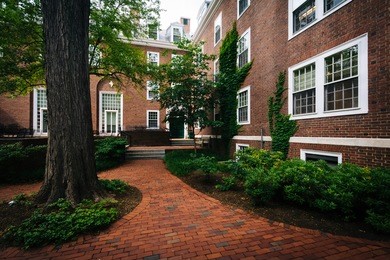 brick walkway and buildings at harvard business school, in boston, massachusetts.