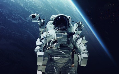 astronaut at spacewalk. cosmic art, science fiction wallpaper. beauty of deep space. billions of galaxies in the universe. elements of this image furnished by nasa