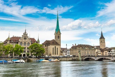 clock tower of the fraumunster cathedral in historical part of zurich in a beautiful summer day, switzerland