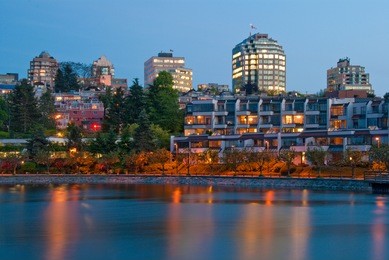 granville island sea walk at windy night in downtown of vancouver, canada.