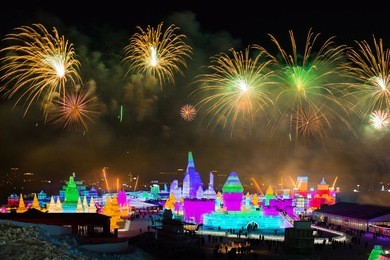 spectacular fireworks over ice and snow sculptures in harbin, china