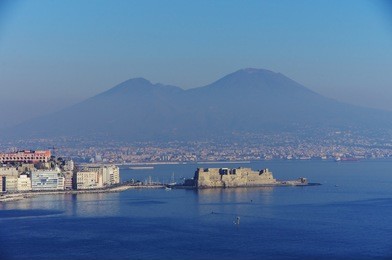 aerial view of naples and its gulf, with the vesuvius in the background