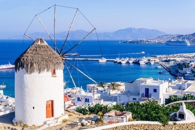 view of mykonos and the famous windmill from above, mykonos island, cyclades, greece