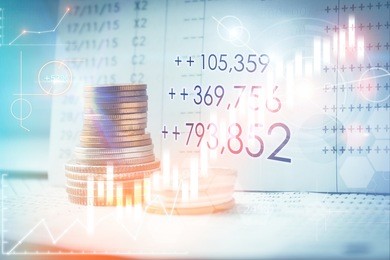 stacks of coins on banking account in the background,color filter,graphs and chart