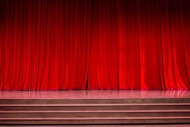 curtains and the stage parquet with stairs in theater with colorful lighting.