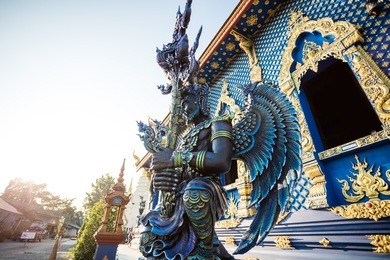 rong sua ten temple with blue sky background, chiang rai province, thailand. blue temple.