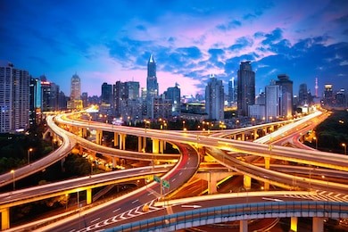 shanghai elevated road junction and interchange overpass at night, shanghai china