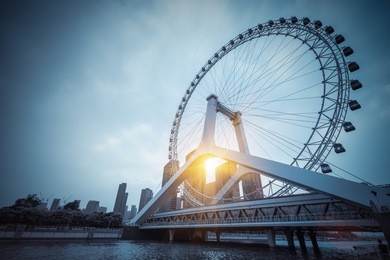 ferris wheel closeup, tianjin cityscape at dusk