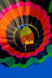 colorful hot air balloon travelling to the sky