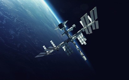 international space station over the planet earth. elements of this image furnished by nasa