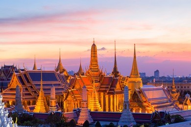 wat phra kaew landmark in bangkok, temple of the emerald buddha and grand palace at twilight in bangkok, thailand,bangkok is the most populated city in southeast asia.