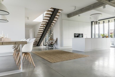 open floor apartment with staircase, dining table and kitchen