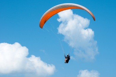 paraglider flies paraglider in the sky. paragliding.