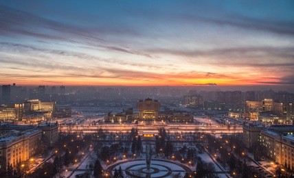 amazing winter sunset over campus of lomonosov moscow state university and fundamental library  - sparrow hills, moscow, russia.