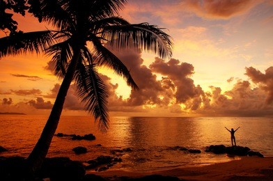 colorful sunrise  on the beach in lavena village on taveuni island, fiji. taveuni is the third largest island in fiji.