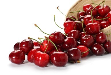 cherries spilling out from the bowl