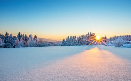 majestic sunrise in the winter mountains landscape. high resolution image