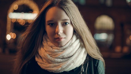 art portrait of a beautiful girl. gorgeous brunette girl, portrait in night city lights. vogue fashion style portrait of young pretty beautiful woman with long dark curly hair.