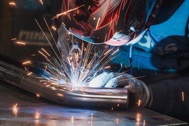 welder in mask welding metal and sparks metal close. spark, protective, welder, tool, flash, welding, skill, equipment, protection, industrial, safety, metalwork, mask, gloves, sparks welding, sparks