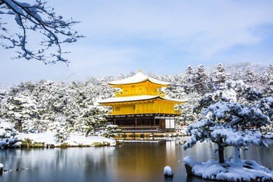 the golden pavilion (kinkakuji) with snow in winter season.