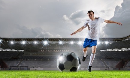 soccer player at sport arena . mixed media