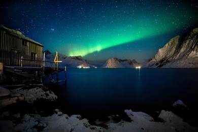 aurora borealis (polar lights). view to steinfjord on senja island - lofoten islands, norway