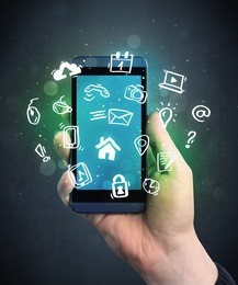 caucasian hand in business suit holding a smartphone with drawn web icons