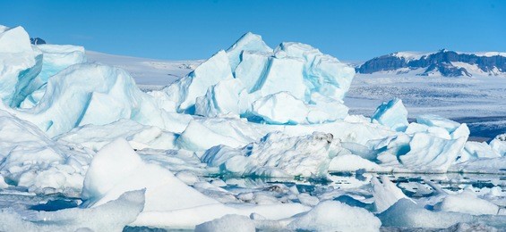 beautiful scenic view of icebergs in jokulsarlon glacier lagoon, iceland, selective focus, global warming concept