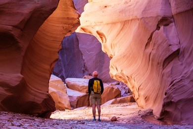 happy canyon fantastic scene. unusual colorful sandstone formations in deserts of utah are popular destination for hikers.