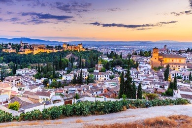 alhambra of granada, spain. alhambra fortress and albaicin quarter at twilight.