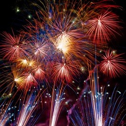 firework streaks in the night sky