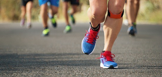 marathon running race in the light of evening