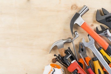 building and measuring tools, set of tools a wood panel with blank space for your text or image