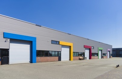 modern business units with colorful roller doors
