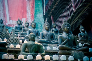 buddha statues in seema malaka temple in colombo, sri lanka