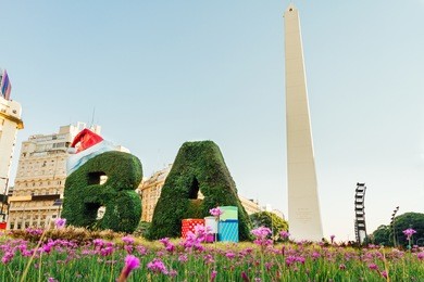 letters b and a made with ligustrines and adorned christmas in front of the obelisk of buenos aires (corner of 9 de julio avenue and corrientes avenue). buenos aires, argentina: january 4, 2017