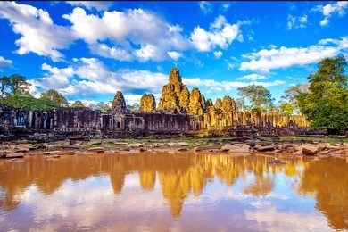ancient stone faces of bayon temple, angkor wat, siam reap, cambodia.
