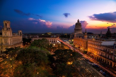 sunset over the capitolio in havana, cuba