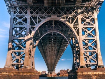 legs of manhattan bridge seen from underneath 