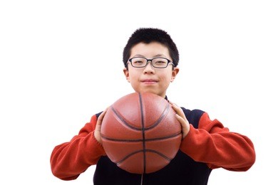 a boy with a basketball