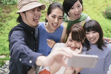 group of japanese friends visiting kyoto