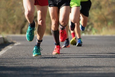 marathon running in the light of evening