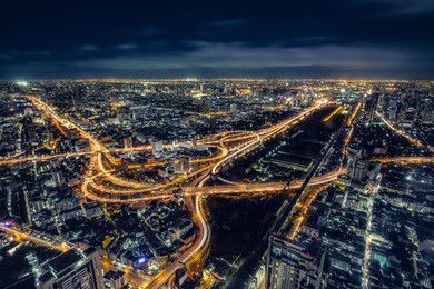 cityscape bangkok downtown at night, from the top of tower baiyoke sky, thailand. and technique long exprosure and hdr filter.