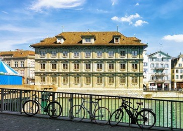 bicycles at old town hall in river limmat in zurich, switzerland