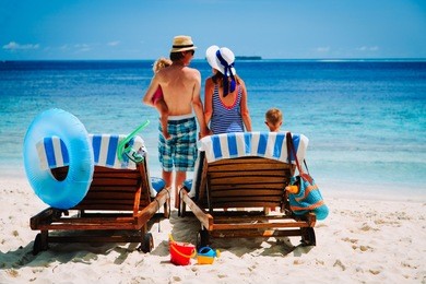 happy family with two kids on beach vacation