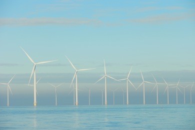 offshore windmill farm westermeerwind windmills on a cold snowy winter morning by urk flevoland noordoostpolder january 2017
