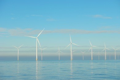 offshore windmill farm westermeerwind windmills on a cold snowy winter morning by urk flevoland noordoostpolder january 2017
