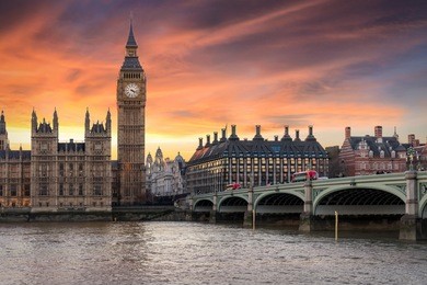 big ben and westminster bridge at intense sunset