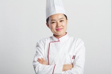 

white background, chinese girl wearing chef dress up making various expressions, asian style people series